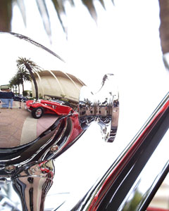 Reflection of a Mercedes-Benz 540 K Cabriolet A in the searchlight of a 540 K Special Roadster